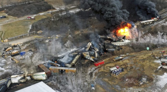 ‘You’re breathing toxic fumes if you’re that close’: As derailed freight cars smolder in Ohio, sheriffs go door-to-door with evacuation orders ‘you’re-breathing-toxic-fumes-if-you’re-that-close’:-as-derailed-freight-cars-smolder-in-ohio,-sheriffs-go-door-to-door-with-evacuation-orders