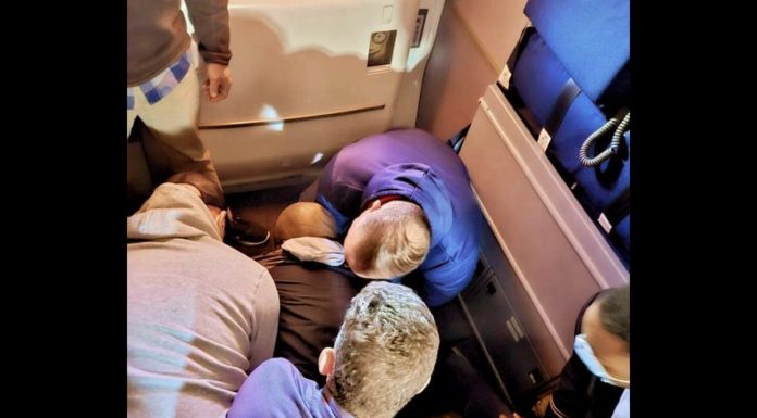 A group of airplane passengers zip-tied a man who tried to stab a flight attendant with a broken spoon: ‘Total teamwork’ a-group-of-airplane-passengers-zip-tied-a-man-who-tried-to-stab-a-flight-attendant-with-a-broken-spoon:-‘total-teamwork’