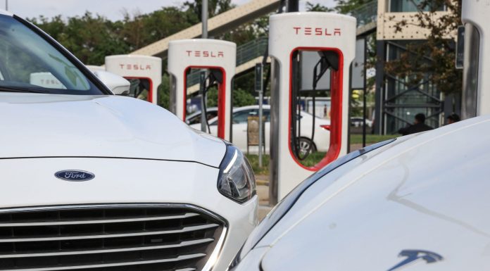 Tesla’s charging deals with GM and Ford will set the U.S. standard and bring in $3 billion annually by 2030, analyst says tesla’s-charging-deals-with-gm-and-ford-will-set-the-us.-standard-and-bring-in-$3-billion-annually-by-2030,-analyst-says