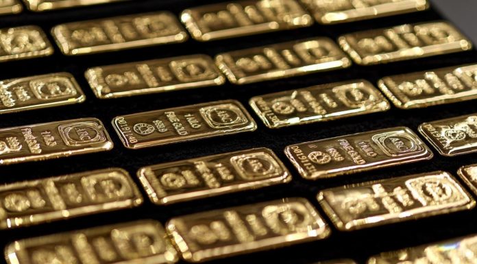Gold Hits Record High on Fed Rate-Cut Hopes, Rising Haven Demand gold-hits-record-high-on-fed-rate-cut-hopes,-rising-haven-demand